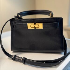 Tory Burch Black and Gold Mini Bag with Structured Design